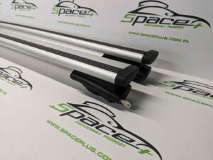 PXL_20250113_134729611_scaled.jpg Bagażnik dachowy bazowy na otwarte relingi Thule 775 wingbar 108cm z napisem Renault.