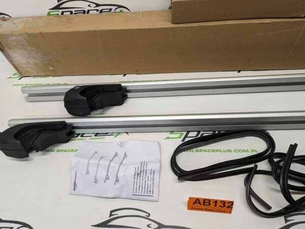 PXL_20250409_161552288_scaled-1.jpg Bagażnik dachowy bazowy belki poprzeczki Amazon Basics 132cm B083T53K3P na otwarte relingi.