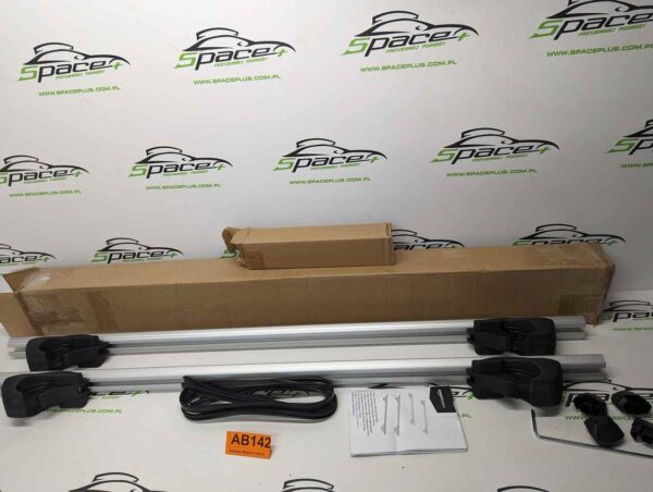 PXL_20250409_162331459_scaled-2.jpg Bagażnik dachowy bazowy belki poprzeczki Amazon Basics 142cm B083T54H2S na otwarte relingi.